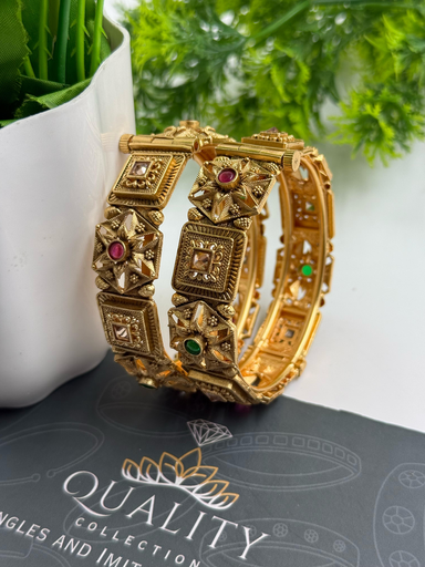 Bold Star Cut Bangles with Red and Green CZ Stones