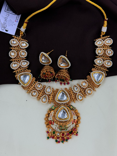 Majestic Triangle Kundan Necklace Set with Red & Green Drops